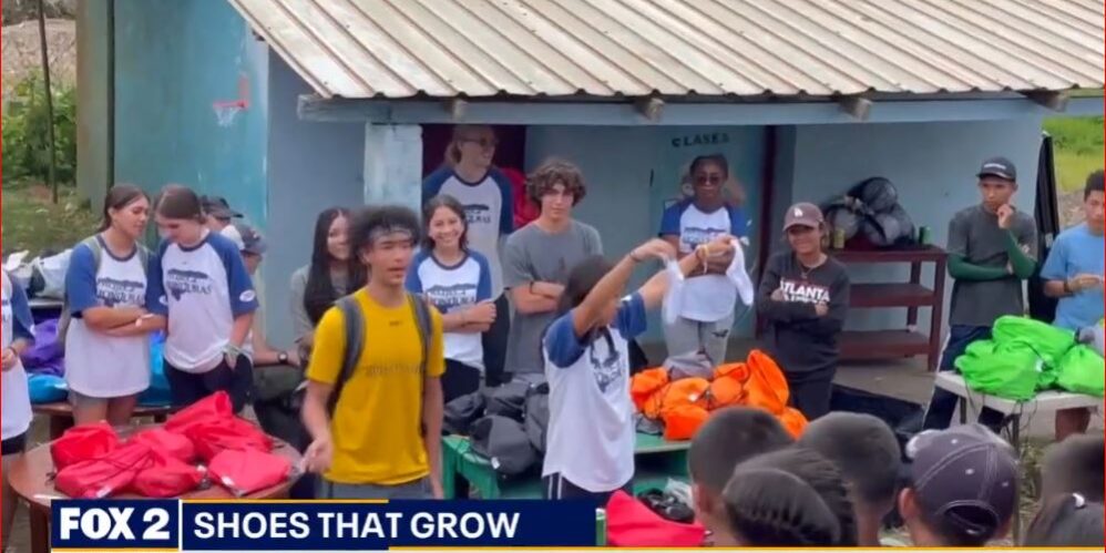 Local scout donates 100 pair of shoes to Honduran village